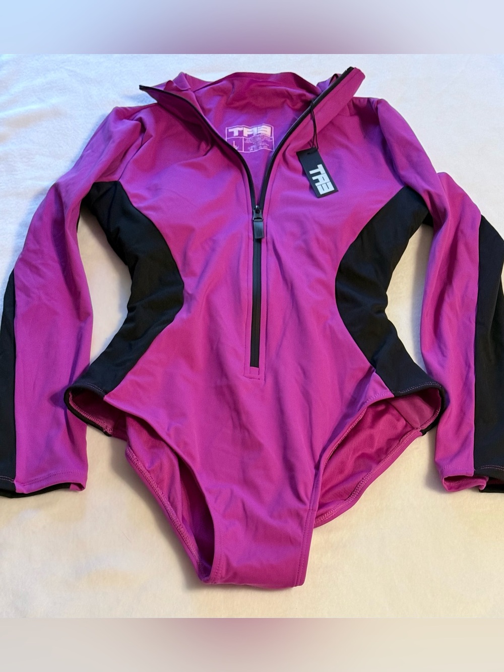 THE Pink Long-Sleeve Zip One-Piece Swimsuit with Black Panels